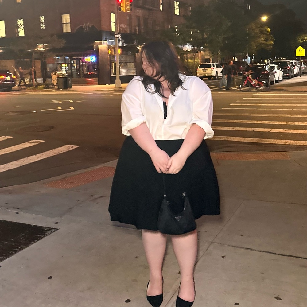 Reformation black flounce skirt, size 24